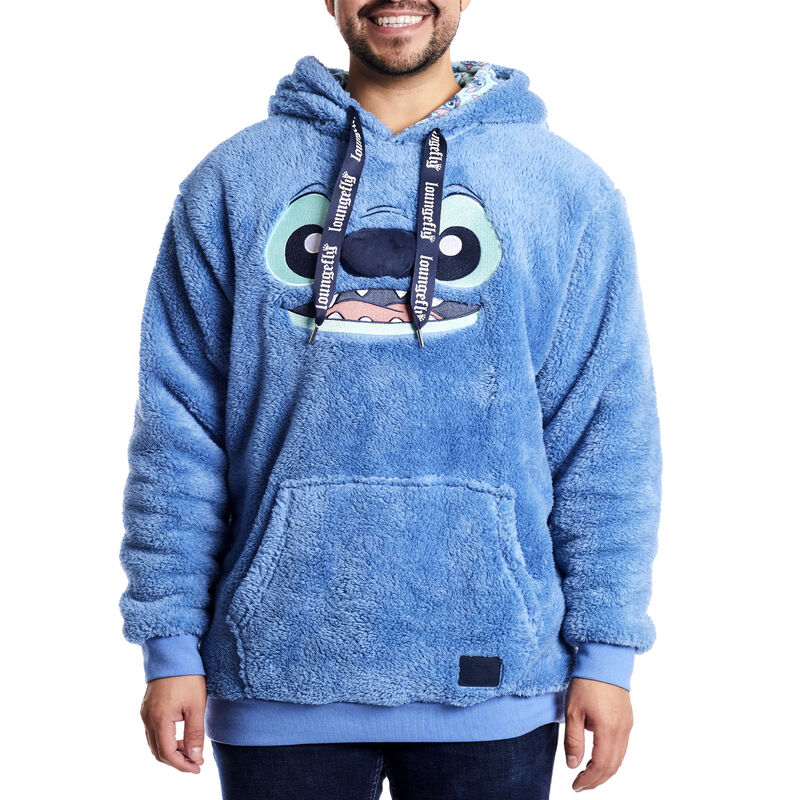 Model wearing the Loungefly Disney Stitch Sherpa Plush Hoodie, featuring soft blue sherpa material and Stitch's face.